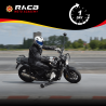 Certaines motos sont équipée de "bras" sur amortisseurs destinée à l'apprentissage de la mise sur l'angle.